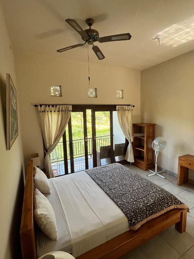 Mesari Homestay & Warung Амед Екстер'єр фото