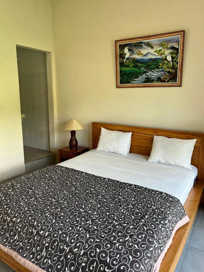 Mesari Homestay & Warung Амед Номер фото